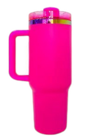 Hot pink tumbler with handle on a rainbow background