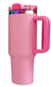 Pink travel mug with handle on a white background